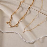 Collier élégant personnalisé en perles avec chaîne en acier inoxydable brillant et pendentif en perle d'eau douce baroque authentique