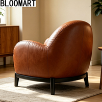 Fauteuil à bascule relaxant et inclinable de style moderne pour salon, avec dossier haut et design ergonomique