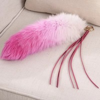 Vente en gros de porte-clés en queue de renard véritable de qualité du fabricant, accessoire coloré en peau de teint par cravate pour les vêtements de voitures nolisées personnalisées