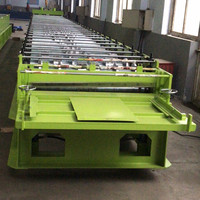 Machine à fabriquer des dalles de plancher en acier composite, machine à fabriquer des dalles de plancher