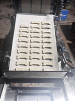 Biscuit rotatif à grande échelle en forme d'os pour chien faisant des biscuits Machine à craquer les noix Ligne de production de biscuits mous