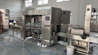Machine de remplissage industrielle automatique multi-têtes à piston avec alimentation par couvercle et machine de capsulage, pour huile comestible, sirop, boisson, alcool