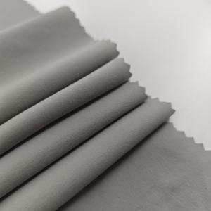 قماش عالي الجودة 88% نايلون 12% سباندكس مقاوم للماء 95 جرام/متر مربع 40D شبه مطفي 146-148 سم قماش نايلون سباندكس مطاطي لسترة واقية من الشمس - Product Image 4