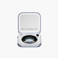 Miroir compact portable Uyisi avec LED à détection UV, conçu pour les routines de beauté modernes