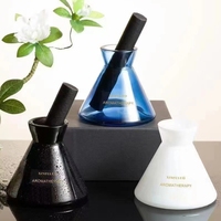 Ornements décoratifs Bouteille diffuseur d'aromathérapie de style nordique Bouteille de parfum en verre de rotin sans feu
