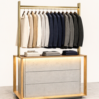 Présentoir à vêtements LED avec cadre doré, armoire à tiroirs et base en bois – Vente directe usine