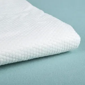 Fábrica al por mayor personalizar superventas limpio e higiénico de alta calidad perla cara toalla materia prima spunlace tela no tejida