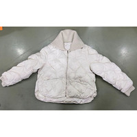 Puffer court unisexe incontournable sur mesure: courtepointe en losange, joints torsadés, artisanat impeccable pour chaque garde-robe