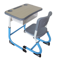 Ensemble de bureaux et chaises en plastique et en bois pour élèves, idéal pour les salles de classe du primaire (vente en gros)
