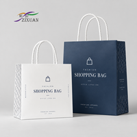 Sac en papier de luxe pour bijoux avec poignée en corde, estampage à chaud, logo personnalisé pour emballage cadeau de boutique
