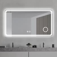 Miroir de salle de bains LED intelligent à éclairage rectangulaire à bas prix personnalisé en usine avec affichage de l'heure de désembuage et Bluetooth