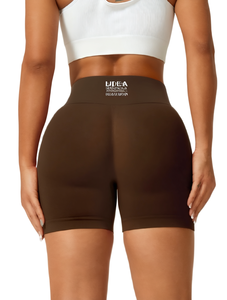 Shorts de sport sans couture pour femmes BIDEA, taille haute, coupe ajustée, tricotés en spandex et polyester, couleur unie, logo au dos, printemps-été - Product Image 1
