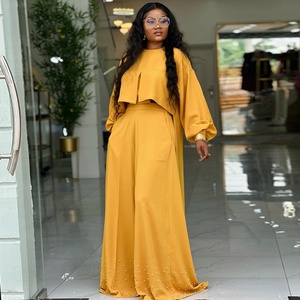 Colección Primavera Verano 2025: Novedad en Ropa Femenina Transfronteriza Europea y Americana - Blusa Suelta de Manga Linterna Irregular con Cuello Novedoso y Color Liso - Product Image 3