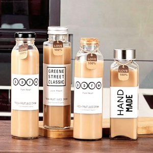Botellas de vidrio transparente y grueso de 250ml, 300ml, 350ml, 500ml con tapa para zumos, bebidas frías, té, enzimas y leche. - Product Image 1