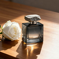 Bouteille de parfum en verre transparent de 50ml 100ml avec boîte OEM de forme unique rechargeable vide de luxe à sertir rectangle carré cube