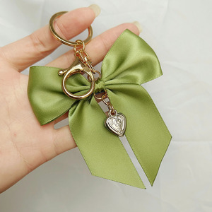 Luxe Cheer Ruban Arc Porte-clés De Mode Mignon Sac À Main Sac Charme Pendentif À La Main Bowknot Porte-clés Cheerleading Coeur Porte-clés - Product Image 4