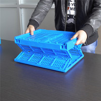 Caisse en plastique pliable et empilable en maille orange pour le stockage et le transport des tomates de ferme, recyclable
