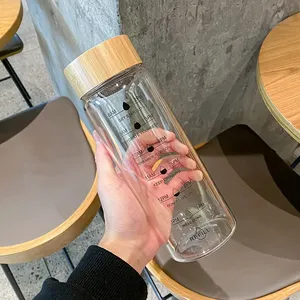 Botella de agua de vidrio de borosilicato de gran capacidad, transparente, 24oz, 34oz, marcador de tiempo, botella de leche para bebidas con tapa de Bambú - Product Image 5