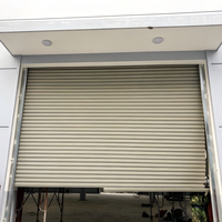Porte à enroulement motorisée en aluminium robuste et résistante au vent pour atelier, porte électrique de sécurité élevée
