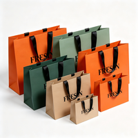 Sac en papier orange moderne avec poignée noire, expédition rapide en 72h, sac de shopping biodégradable pour la vente au détail