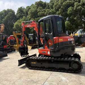 Mini-excavatrice Kubota U55 d'occasion, 5 tonnes, chenilles en caoutchouc, avec grappin à bois, d'origine japonaise, à vendre - Product Image 1