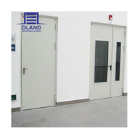 Porte coupe-feu en acier OLAND de haute qualité, résistance au feu 1,5h, ouverture battante, design industriel, installation facile, cadre en acier préfini