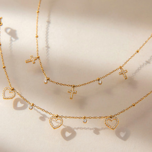Pulsera de aleación de zinc con forma de corazón, cruz y diamantes incrustados, ideal para regalo. - Product Image 2