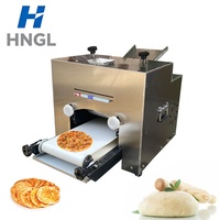 Machine industrielle pour la fabrication rapide de pizzas, machine à faire des bases de pizzas surgelées