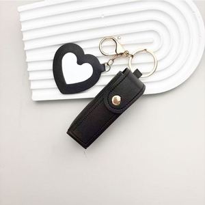 New Portable PU Leather <b>Lipstick</b> Case Bags Keychain with Heart Pendant Mini Lip Balm Holder Pouch for Women With Charm Key Ring - Product Image 3