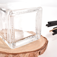 Meilleure Bouteille Diffuseur d'Arômes Ronde de 50 ml en Verre Dépoli Décoratif avec Bouchon à Vis Métallique et Logo Personnalisé
