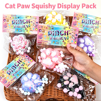 Jouets Mochi Squishy en Peluche Patte de Chat avec Sensation de Douceur à Presser pour le Plaisir au Bureau