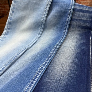 Tissu denim brut extensible Lizhi 3/1 sergé droit sanforisé gris indigo texturé, 98% coton 2% élasthanne - Product Image 1