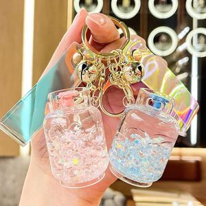 Acrylic Luminous Oil and Gas tank Keychain <b>Floating</b> Quicksand Pendant Exquisite Car Keychain Jewelry Wholesale - Product Image 2