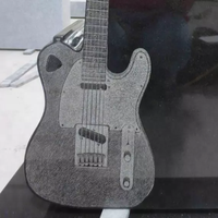 Conception personnalisée pierre de tête de guitare sculptée en granit noir de grande qualité