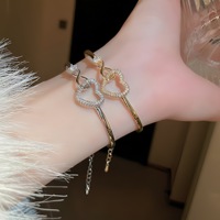 Bracelet tendance en acier inoxydable 316L, nouveau modèle transfrontalier, motif cœur ajouré, plaqué PVD 18K, vente directe usine OEM