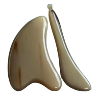 Planche de massage triangulaire en corne de vache pour le visage et le contour des yeux, avec acupression et soulagement musculaire