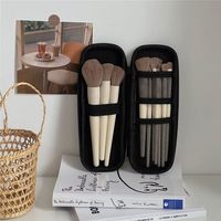 Organisateur de pinceaux de maquillage en lin noir pour femmes - Étui de voyage portable, design résistant aux chocs, support pour pinceaux à paupières, compartimenté