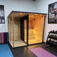 Sauna extérieur moderne en bois de cèdre noir imprimé pour 2 à 6 personnes, avec poêle à vapeur et pierres volcaniques, idéal pour villa ou parc.
