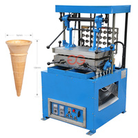 Machine semi-automatique pour la fabrication de cornets de glace, de gaufrettes et de biscuits