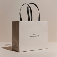 Sac cadeau d'emballage de vêtements ivoire recyclé personnalisé avec poignée en ruban Sacs à provisions en papier beige crème de luxe avec votre propre logo