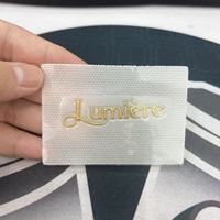 Étiquettes thermocollantes personnalisées en TPU doré métallisé 3D en relief, écologiques, en rouleau, pour vêtements et sacs