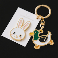 Chaude haute bande dessinée mignon métal Animal forme chien canard lapin porte-clés créatif conception libre dur doux émail impression or porte-clés