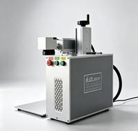 Machine de marquage laser flexible pour métal, plastique, verre, impression de codes QR, haute vitesse, personnalisable, faible coût d'entretien