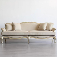 Canapé trois places droit sculpté haut de gamme en tissu de luxe léger de style américain, design du milieu du siècle pour salon