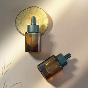 Eco Friendly Custom 30ml Amber Glass Dropper <b>Bottle</b> for Essential Oils with Unique Bottom Design - Product Image 2