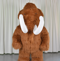 Costume en peluche de mamouth à dents blanches, mascotte de scène préhistorique de l'ère glaciaire, pour la création d'ambiance dans les sites touristiques et les défilés de rue