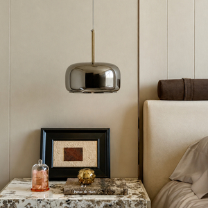 Suspension minimaliste ovale en métal avec abat-jour miroir pour éclairage de chambre de villa - Product Image 1