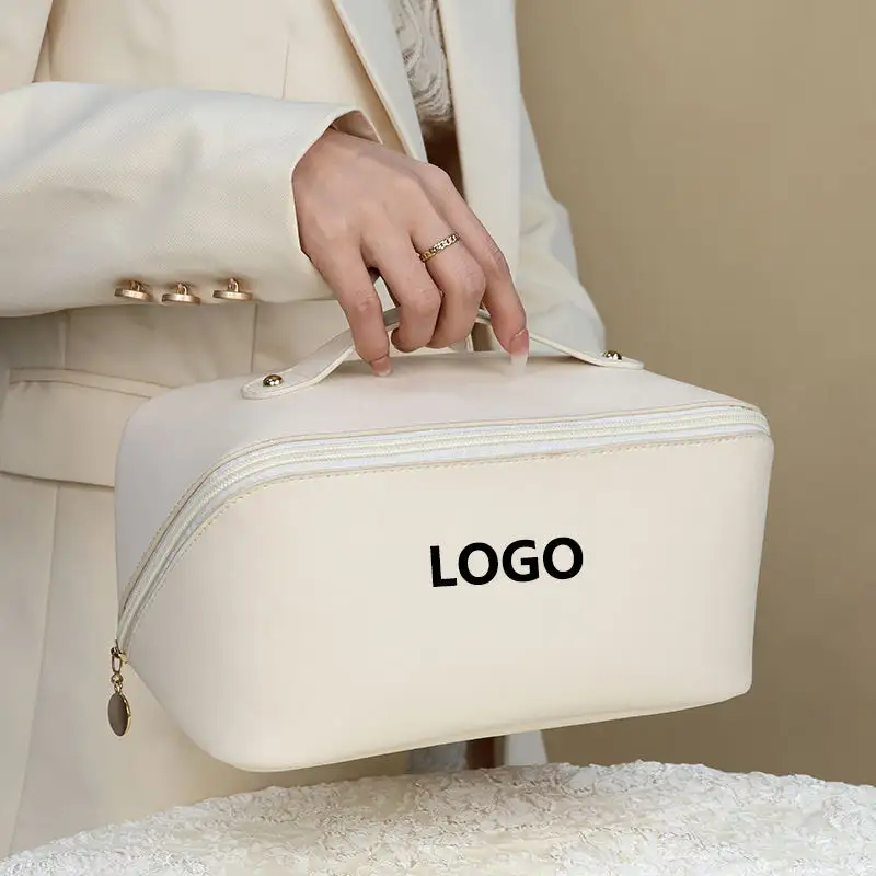 Bolsa de maquillaje cosmético de cuero PU de gran capacidad con logotipo personalizado de viaje impermeable al por mayor con cremallera