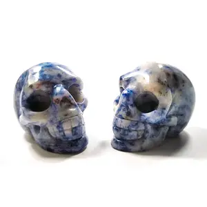 Hot sale natural carved various kinds of stone Chinese blue spot jasper 2 inch skulls head ornament Crafts