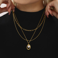 Collier ras du cou tendance pour femme en acier inoxydable 316L plaqué or PVD 18 carats avec pendentif perle d'eau douce et chaîne à maillons trombone